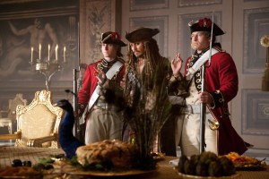 "PIRATES OF THE CARIBBEAN: ON STRANGER TIDES"..A prisoner in St. James Palace, Captain Jack Sparrow (JOHNNY DEPP) tries to make himself scarce when Barbossa (Geoffrey Rush), now a privateer in service to the British Crown, enters the hall...Ph: Peter Mountain..©Disney Enterprises, Inc. All Rights Reserved.